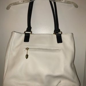 White and Black accent LULU purse good condition.